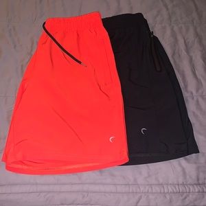 Two Pair of ZYIA Men’s workout shorts.